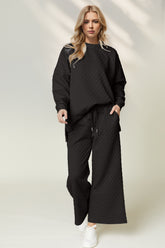 Double Take Checkered Slit High-Low Round Neck Top and Wide Leg Pants Set Black OutfitFlow